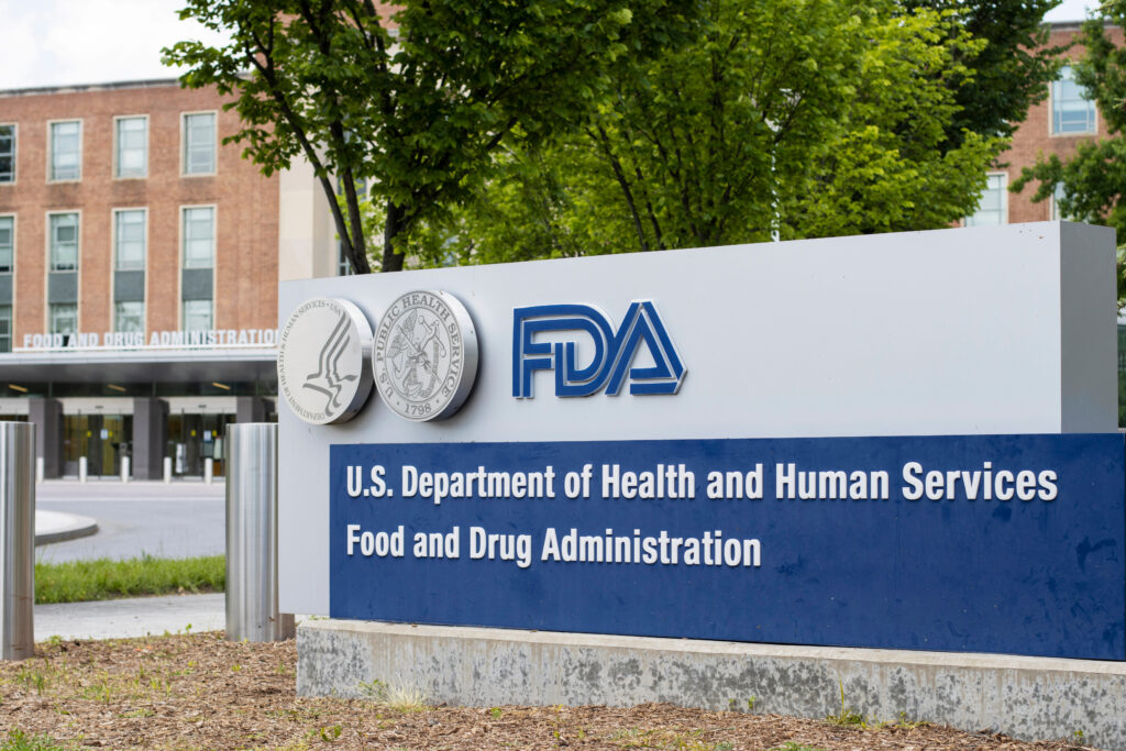 Sign in front of building that says "FDA U.S. Department of Health and Human Services Food and Drug Administration."
Picture by Tada Images.